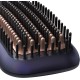 Heated straightening brush